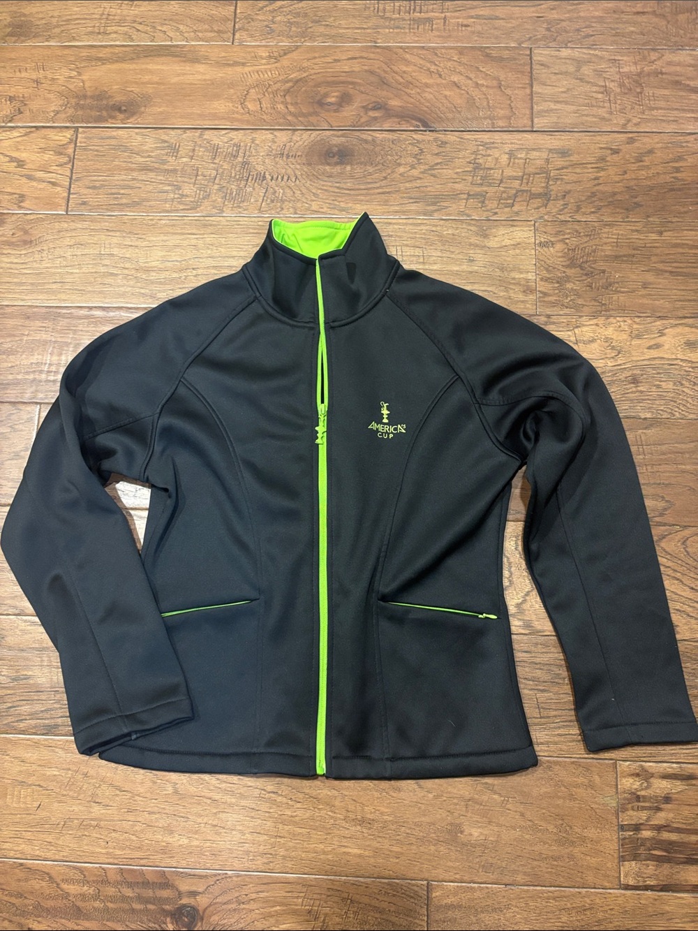 America’s Cup Unixes Black Jacket with Lime Trim